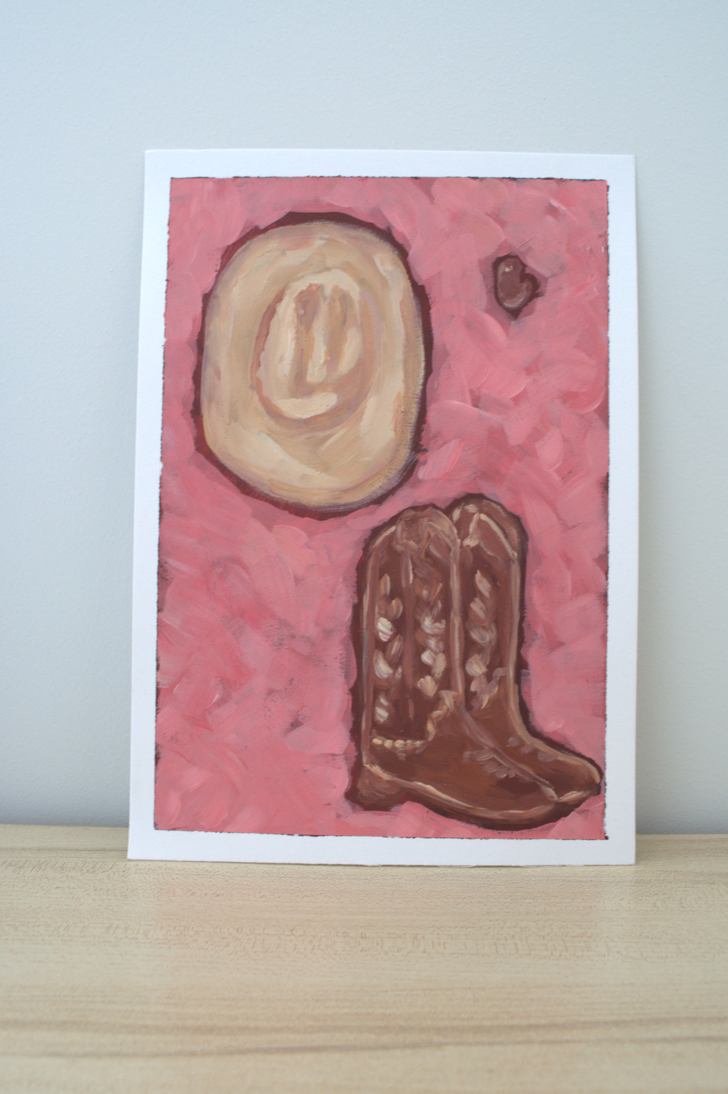 Cowboy hat and boots on pink by Mercedes Michel — alternate view 3